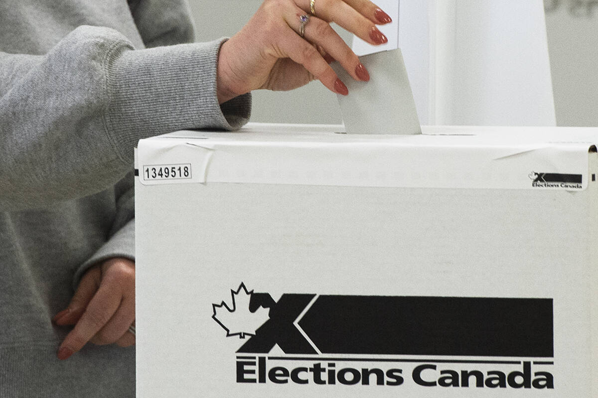 A voter casts their ballot in the advance polls, Friday, September 10, 2021 in Chambly, Que. Canadians will vote in a federal election Sept. 20th. THE CANADIAN PRESS/Ryan Remiorz