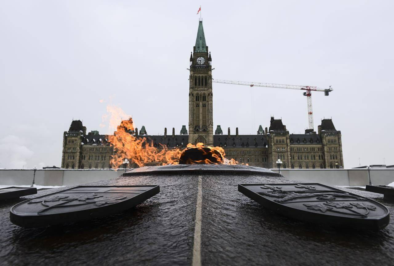 The Peace Tower is pictured on Parliament Hill in Ottawa on Monday, Jan. 25, 2021, as lawmakers return to the House of Commons following the winter break. Newly-elected MPs are to be ordered to take a training course to prevent harassment, including sexual harassment, in their offices. THE CANADIAN PRESS/Sean Kilpatrick