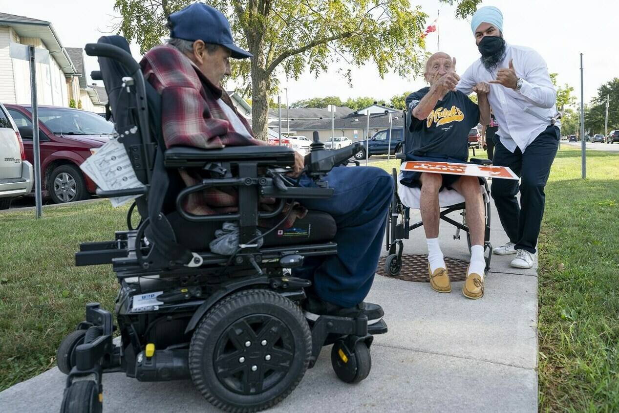 NDP leader Jagmeet Singh greets supporters following his morning announcement in Essex, Ontario on Wednesday, September 15, 2021. THE CANADIAN PRESS/Jonathan Hayward