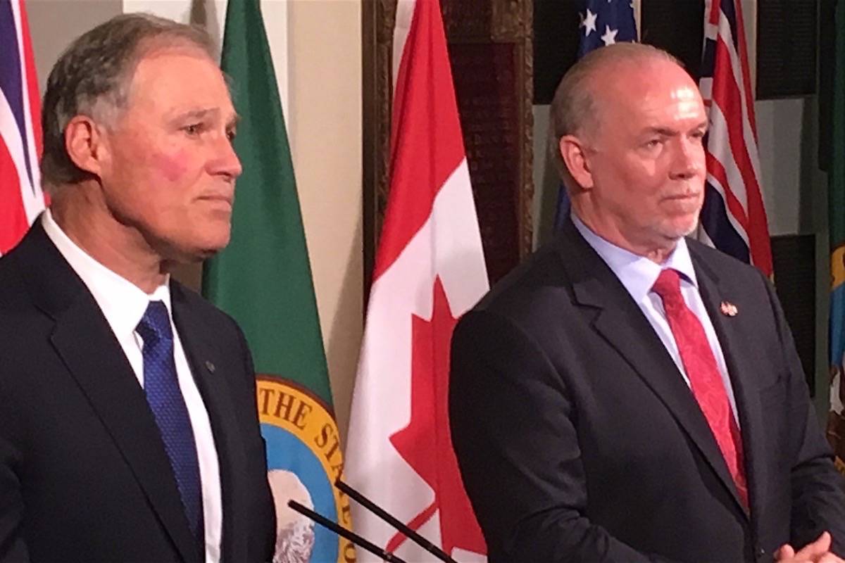 Washington Gov. Jay Inslee and B.C. Premier John Horgan take questions at the B.C. legislature, Nov. 21, 2017. (Tom Fletcher/Black Press)