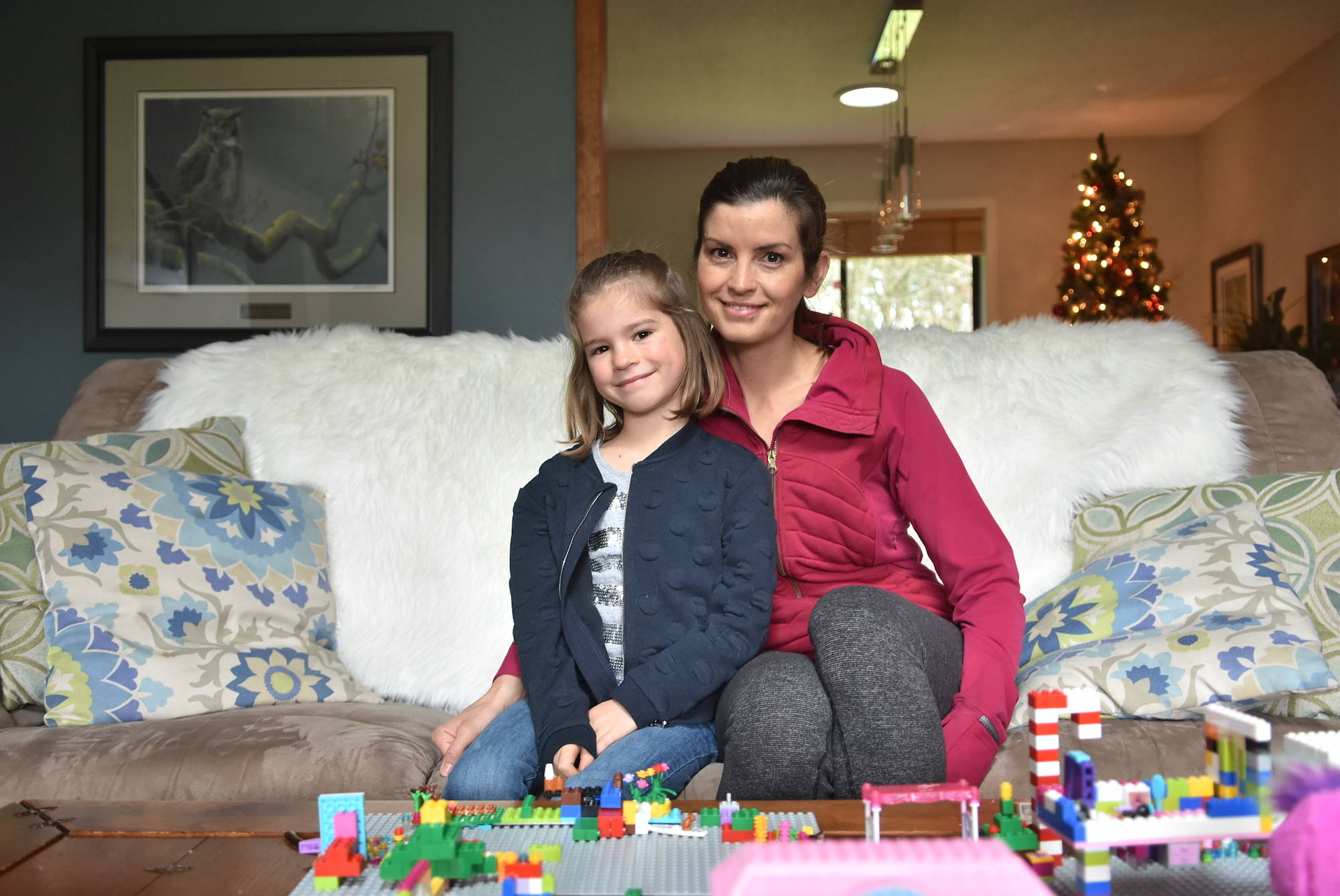 Six-year old Cassidy Slingsby, who makes her feature film debut as “Chloe” in The Christmas Calendar, sits with her mother Katherine. (Hugo Wong/News Staff)