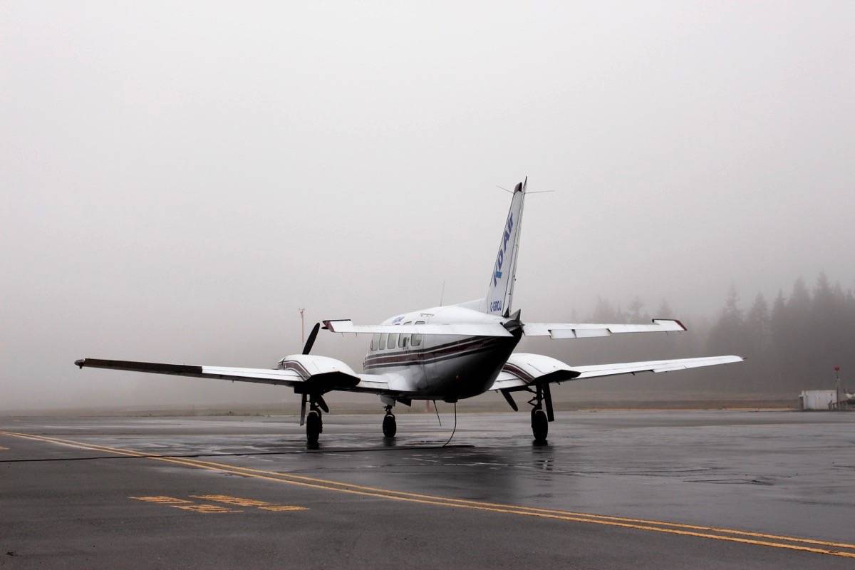 A KD Air plane on the tarmac at Qualicum Beach Airport Friday, Dec. 8. Multiple flights out of Qualicum Beach were cancelled Dec. 7 and 8 due to a fog advisory. — Lauren Collins photo
