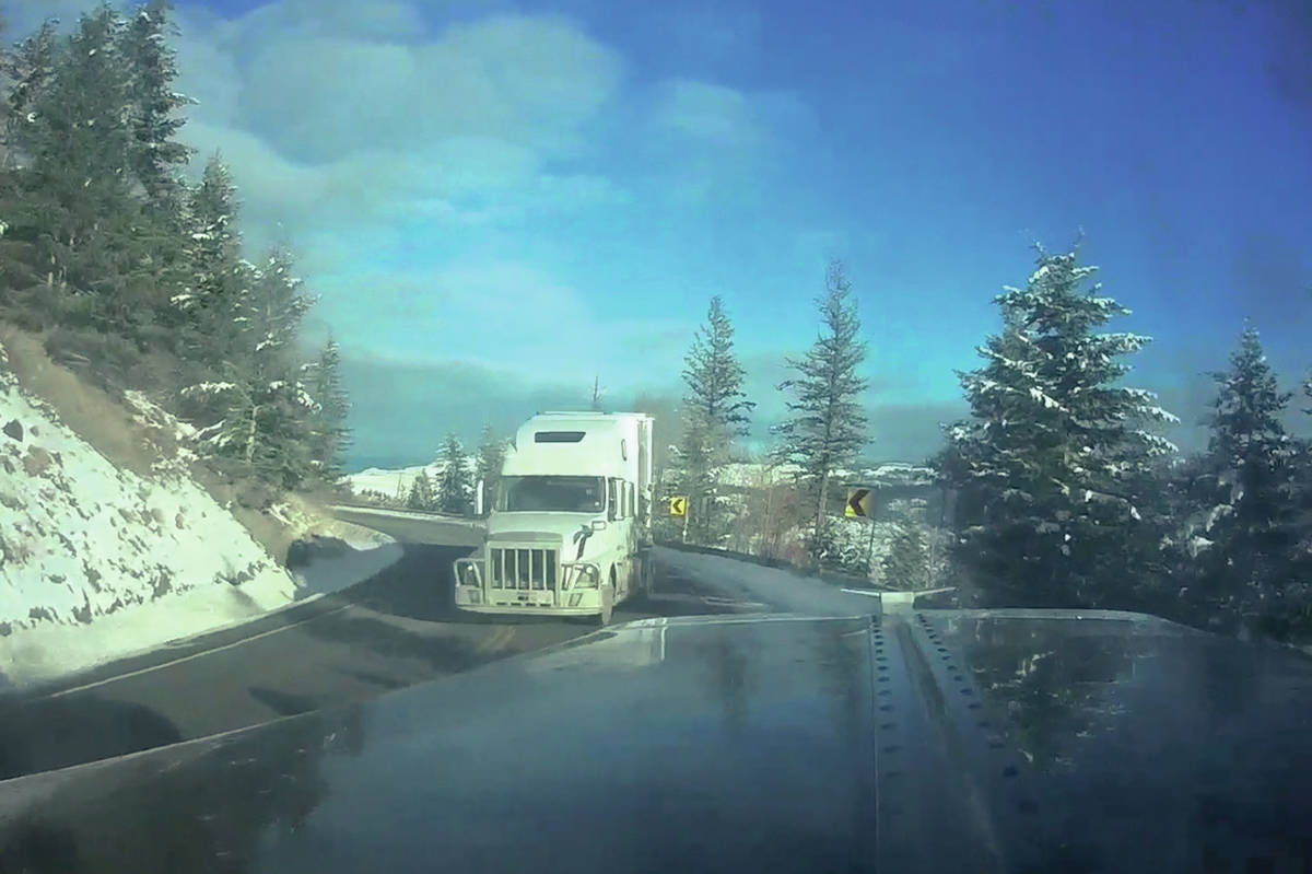 Imagine rounding a mountain bend and to see a transport truck coming towards you in your own lane. That is the image captured by this dash cam, during a near miss on Highway 3 near Sunday Summit.