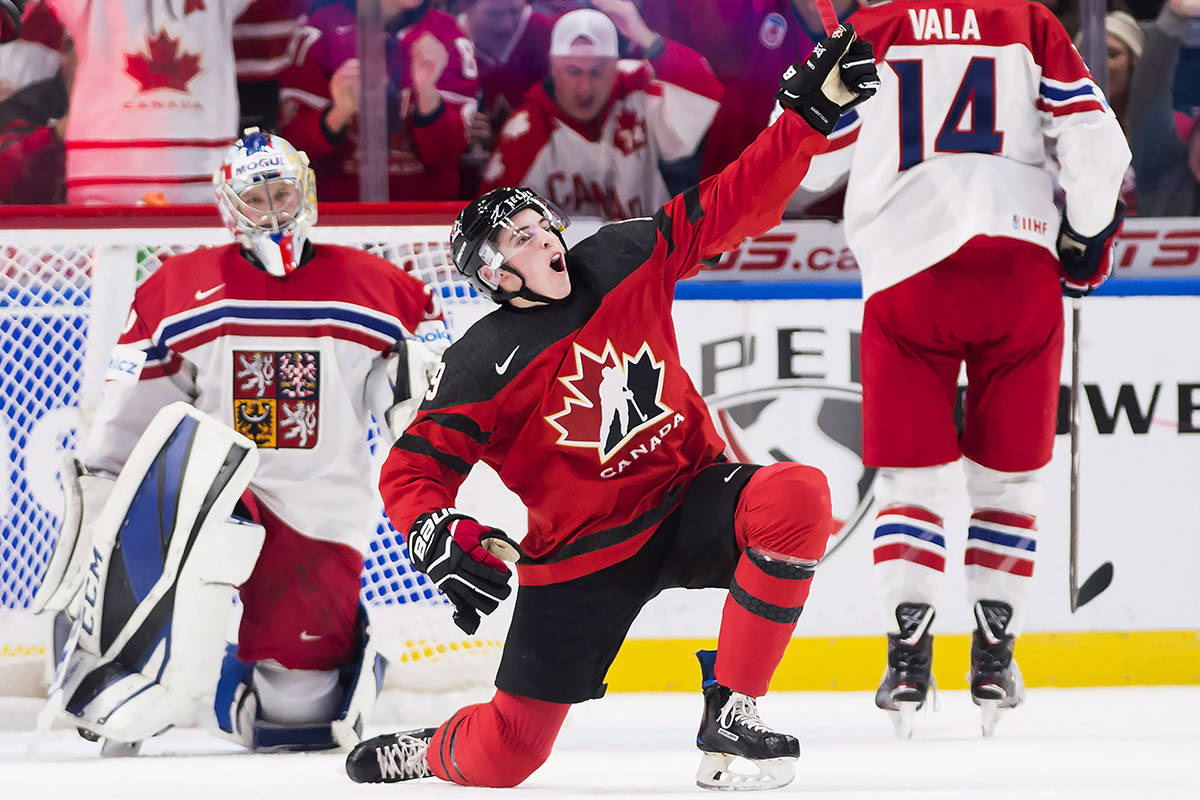 Canada forward Drake Batherson (19) celebrates after scoring against Czech Republic goaltender Josef Korenar (30) during second period semifinal IIHF World Junior Championships hockey action in Buffalo, N.Y., on Thursday. (THE CANADIAN PRESS)