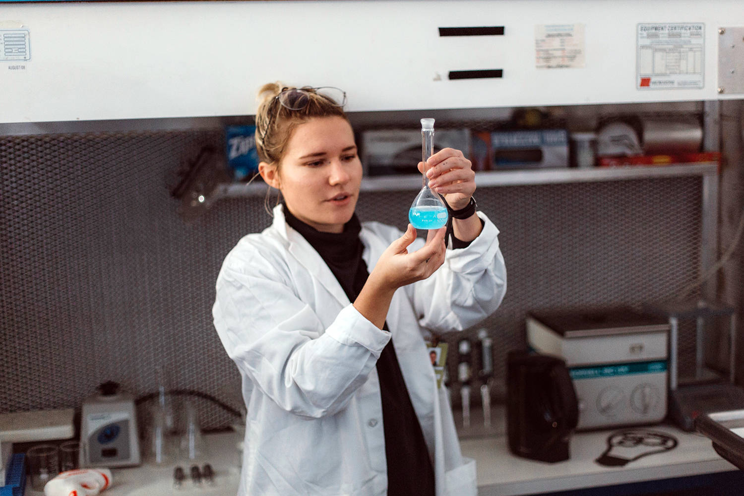 UVic student Paige Whitehead is busy in the lab developing an algae-based compostable glow-stick called Light Wand that she plans to market at festivals around the province over the summer. (Photo submitted)