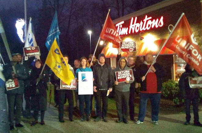 Double-doubles and demonstrations: Employees rally outside Tim Hortons