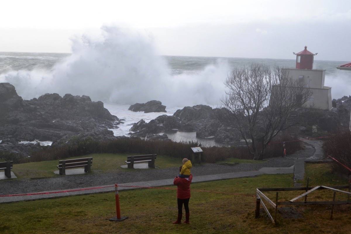 Brigitte Rudan and her toddler, Alexander, caught the monster wave storm from a safe viewing area established on the Wild Pacific Trail. (Nora O’Malley / Westerly News)