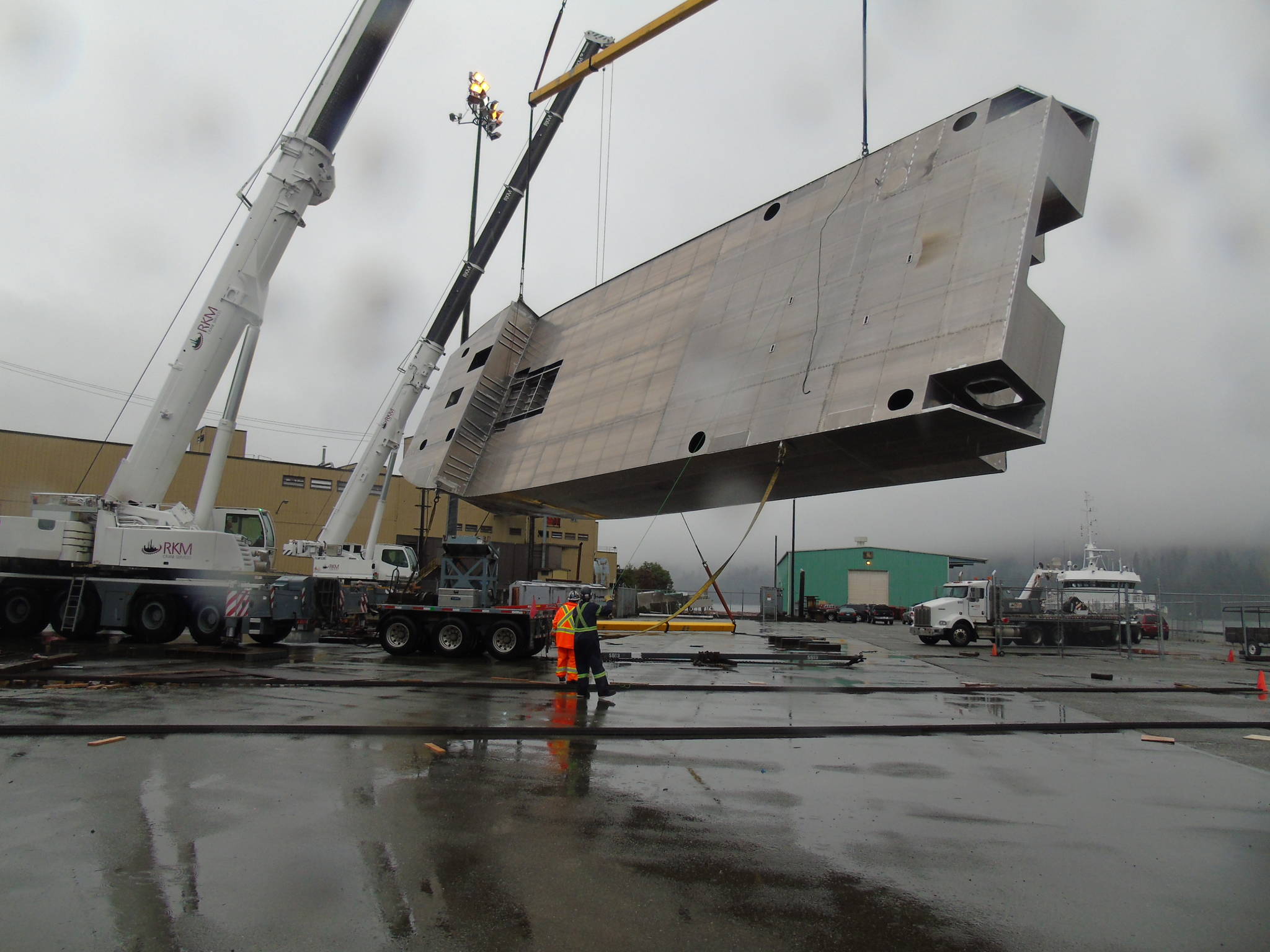 Canadian Maritime Engineering crews flip an 85-foot catamaran they’re building to the Prince Rupert company West Coast Launch. PHOTO COURTESY GORDON YELLAND