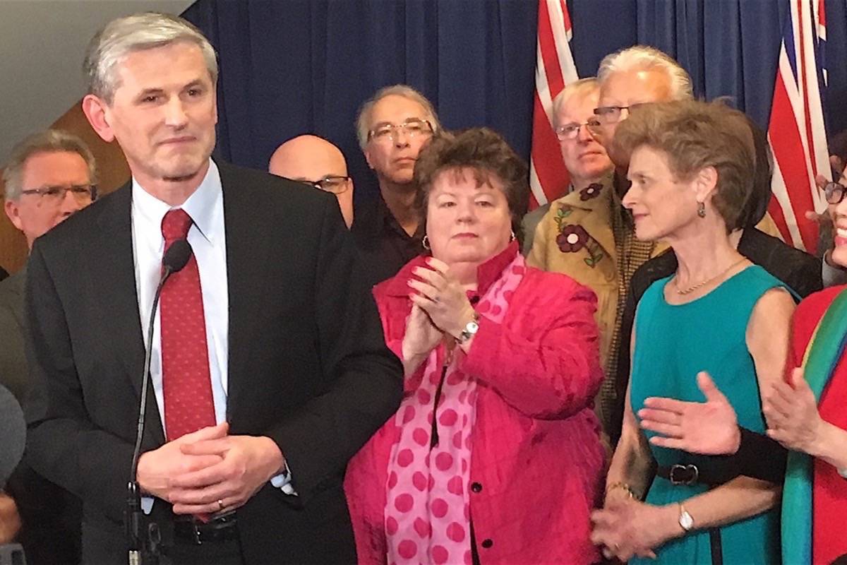 B.C. Liberal leader Andrew Wilkinson thanks supporters in Vancouver, joined by MLAs and his wife Barbara Grantham (right). (Tom Fletcher/Black Press)
