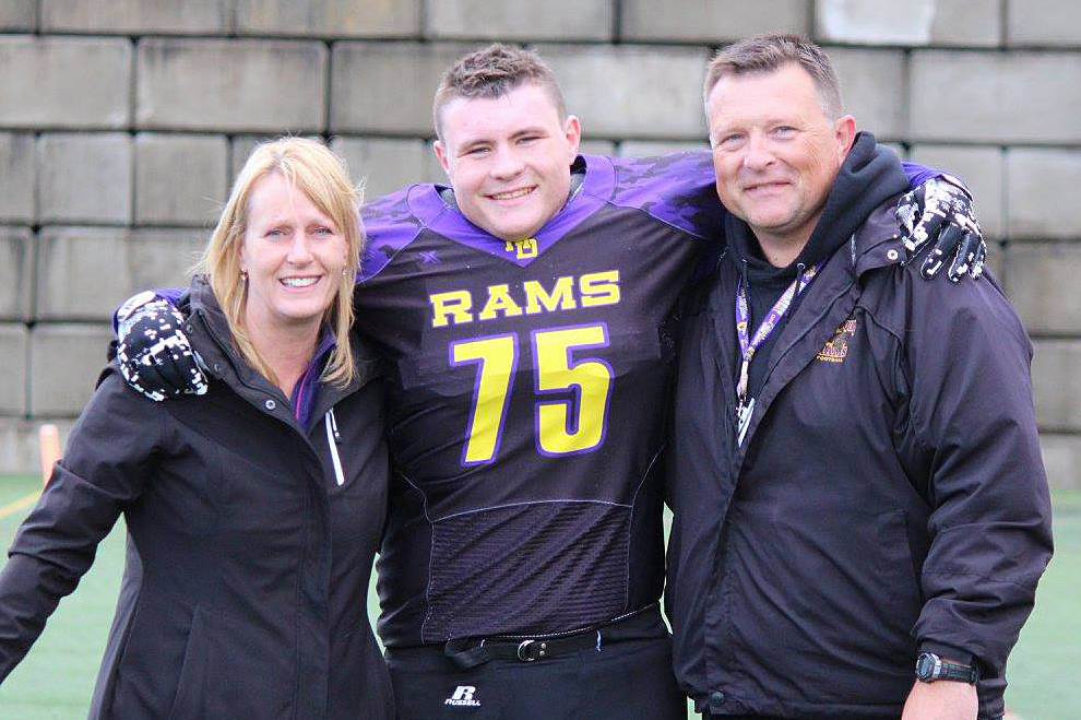 Jake Ounsted and his mom Cathie and dad Chris. Jake has played for Mt. Doug football for four years and this weeks officially signed his NCAA letter of intent to play with the University of Massachusetts Minutemen. (Submitted)