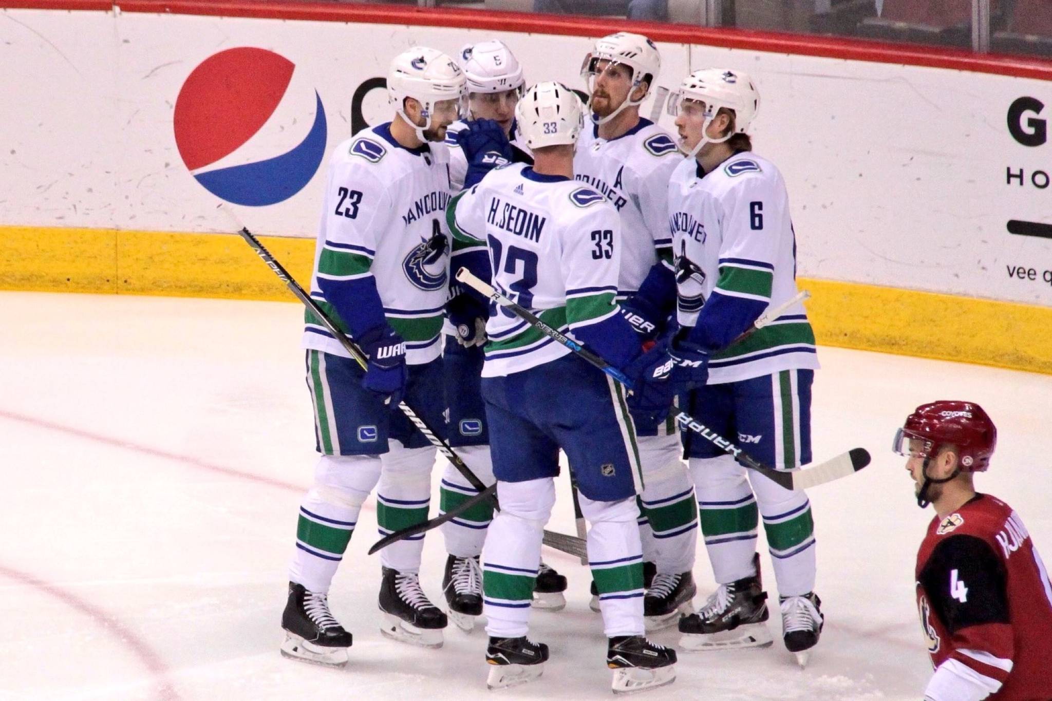 Daniel Sedin celebrates his first of two goals on the night as the Canucks oust the Coyotes (via @Canucks/Twitter)