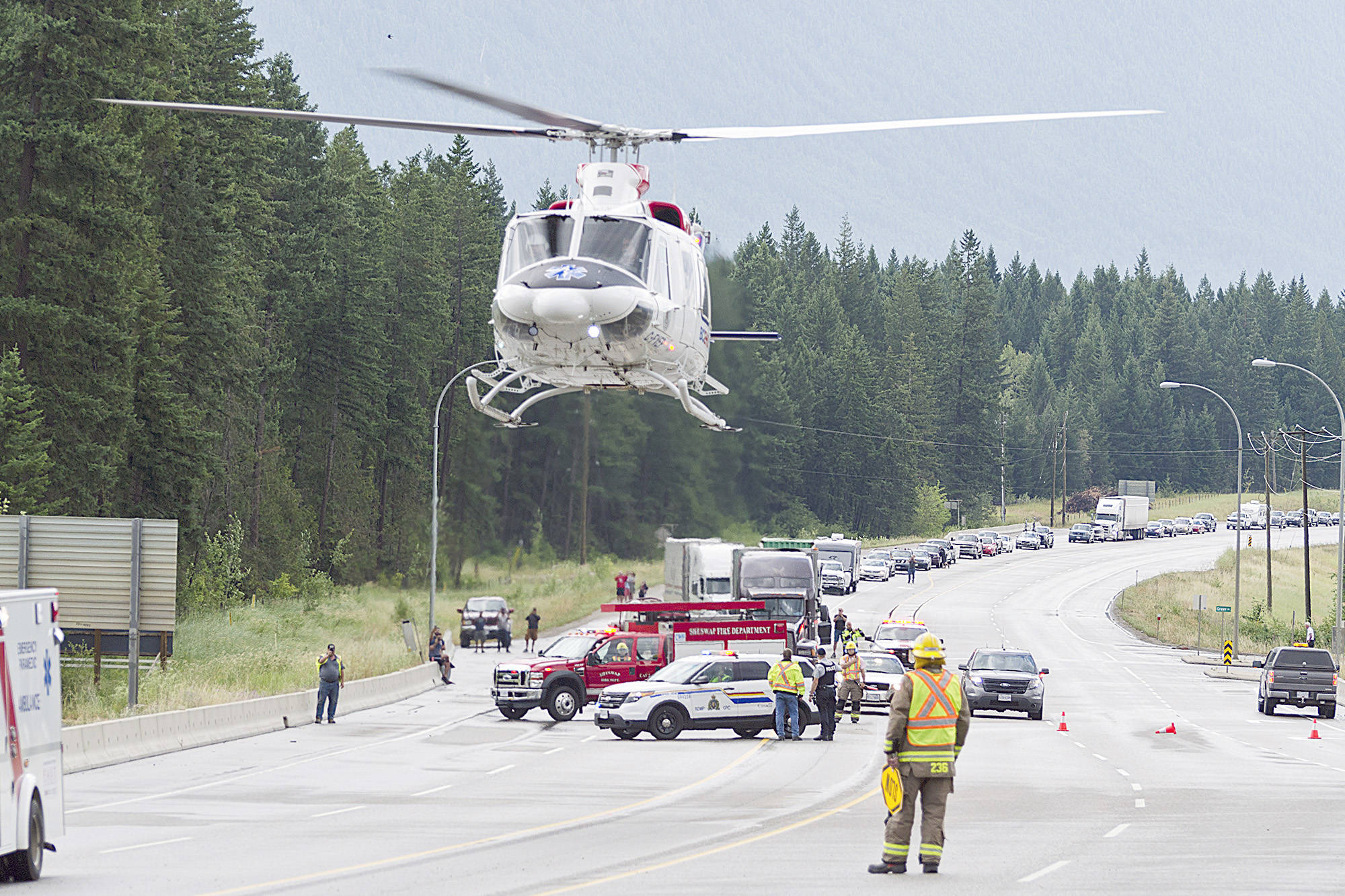 FILE — An air ambulance helicopter lifts off with a patient following a multiple-vehicle collision on Highway 1 near Shuswap Lake Estates on Thursday, July 20. (Lachlan Labere/Black Press)