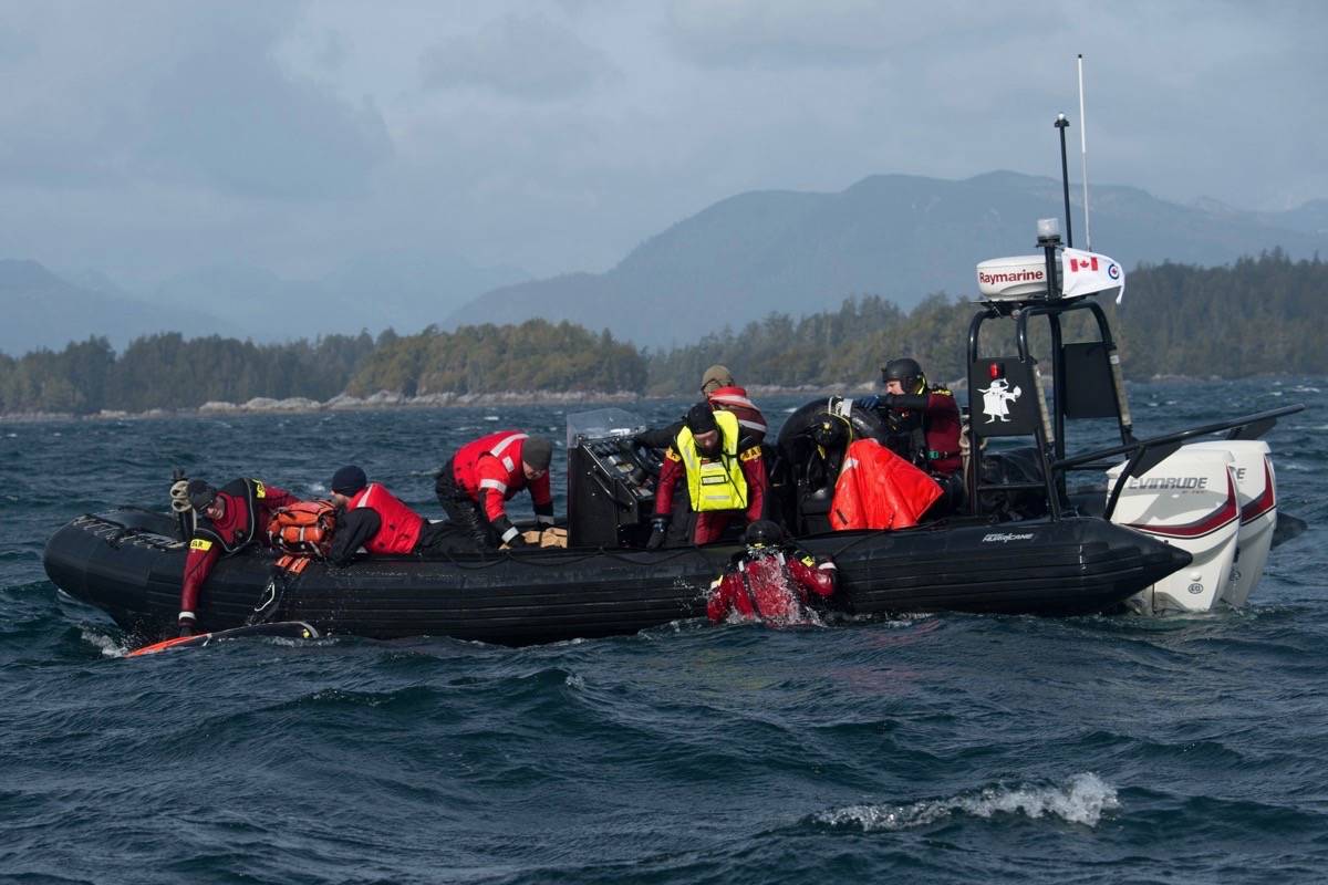 The 19 Explosive Disposal Flight’s Rigid-hulled inflatable boat recover Search and Rescue technicians after their water jump during a 442 Squadron Search and Rescue Exercise in Tofino on Feb. 27, 2018. Photo by Cpl. Joey Beaudin