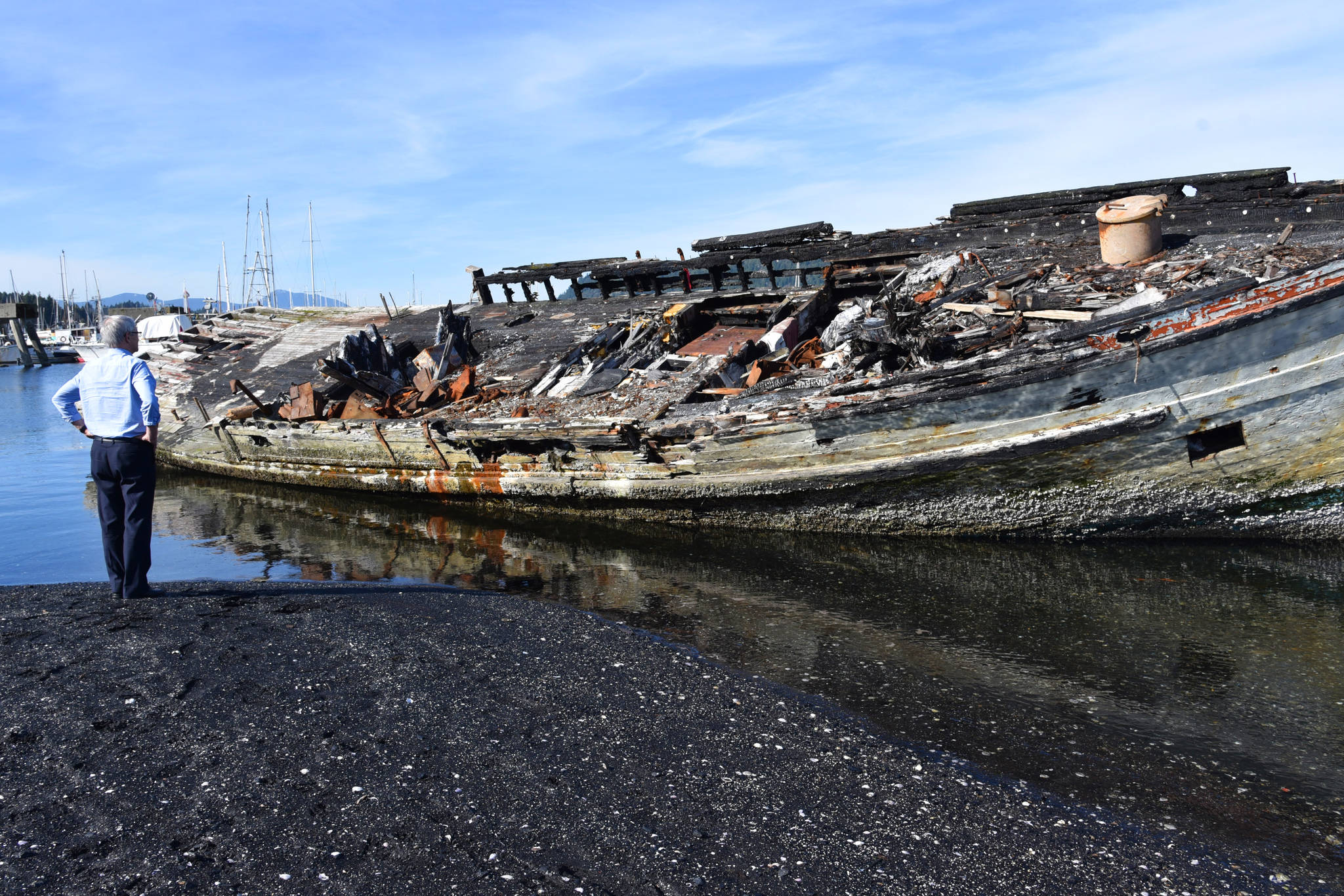 Transport Minister Marc Garneau views one of the derelict vessels at Ladysmith’s Slack Point on Monday afternoon. (Mike Gregory Photo).