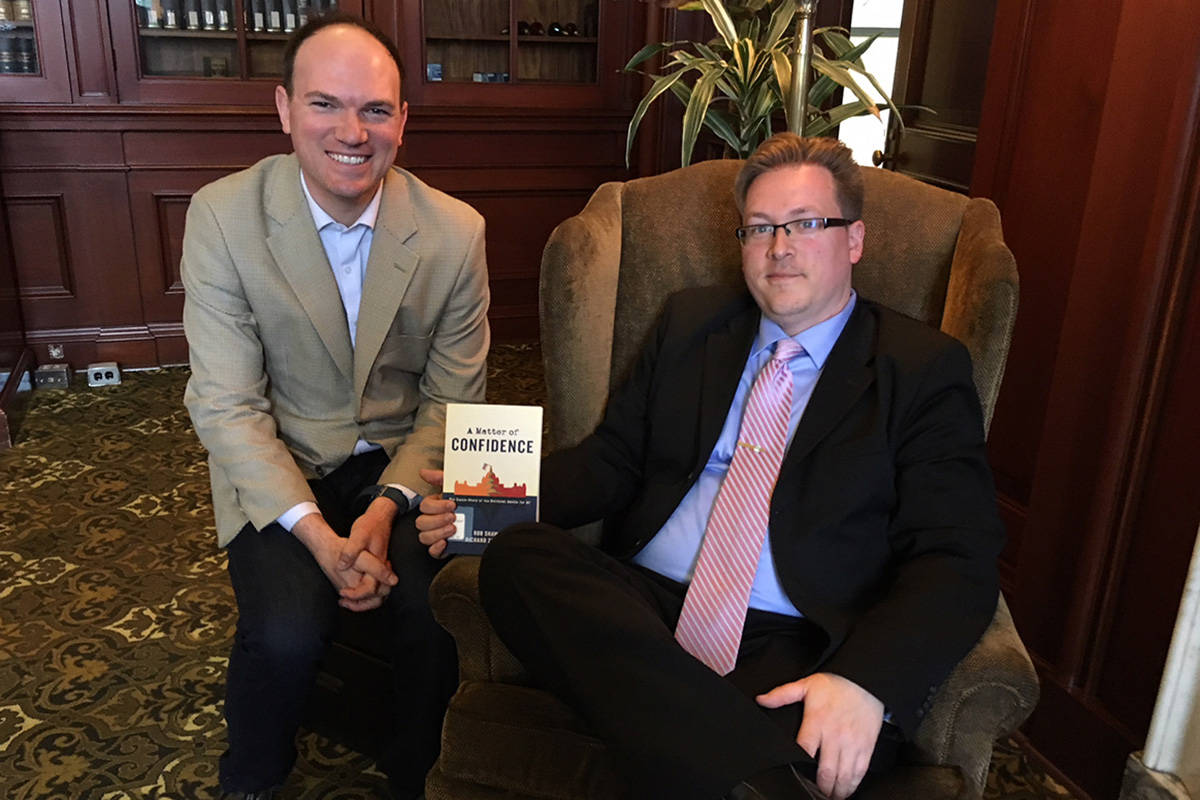 Richard Zussman and Rob Shaw with their new book, A Matter of Confidence: The Inside Story of the Political Battle for B.C., a collaborative project the two legislative reporters teamed up on after the fall of Christy Clark’s Liberal government gave way to a John Horgan-led NDP provincial government. Kristyn Anthony/VICTORIA NEWS