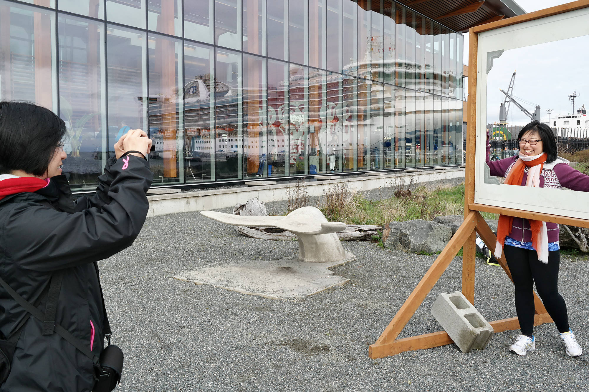 Cecelia Chei, left, and Alice Ip, of Vancouver, take some snapshots of Nanaimo’s waterfront Monday (April 9). The women are passengers about the M.V. Star Princess on an eight-day cruise from Los Angeles, Calif., to Vancouver. (CHRIS BUSH/The News Bulletin)