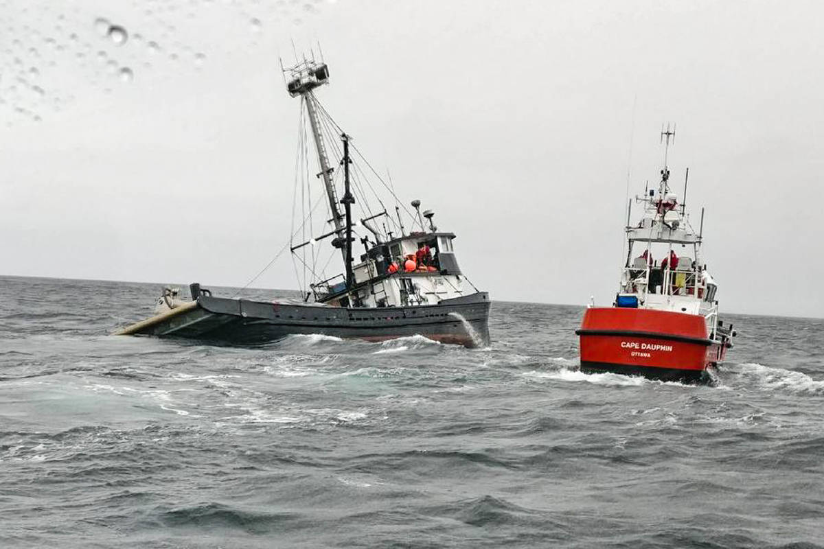Western Commander issued a mayday call at 9:34 a.m. and was listing when the Coast Guard and RCM SAR 64 crews arrived on scene. (RCM SAR 64 photo)