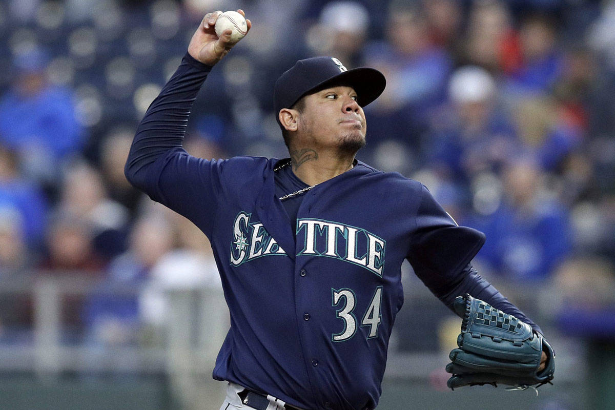Seattle Mariners starting pitcher Felix Hernandez delivers to a Kansas City Royals batter during the first inning of a baseball game at Kauffman Stadium in Kansas City, Mo., Tuesday, April 10, 2018. (AP Photo/Orlin Wagner)