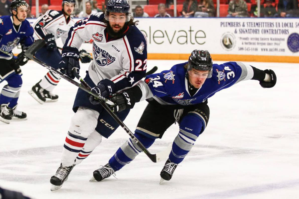 Victoria’s Kaid Oliver (34) and Tri City’s Nolan Yaremko battle in Western Hockey League playoff action in Kennewick, Wash. The Americans completed a 4-0 sweep of their Western Conference semifinal series, beating the Royals 5-3 on Wednesday. Photo by Doug Love/victoriaroyals.com