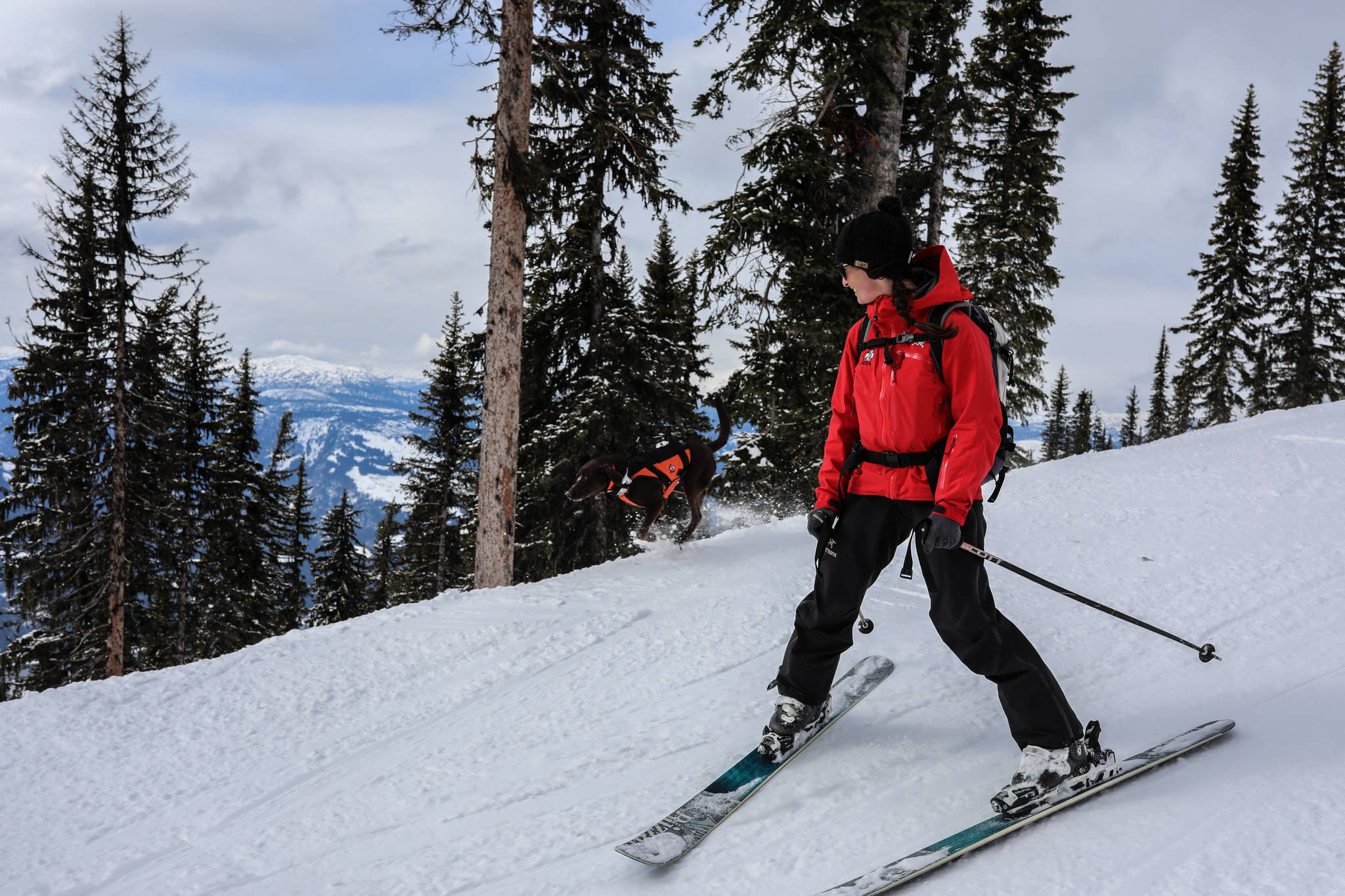 Jeni Gibbs and Joss take in some fun on a clear March day at Revelstoke Mountain Resort. (Jake Sherman/Revelstoke Review)