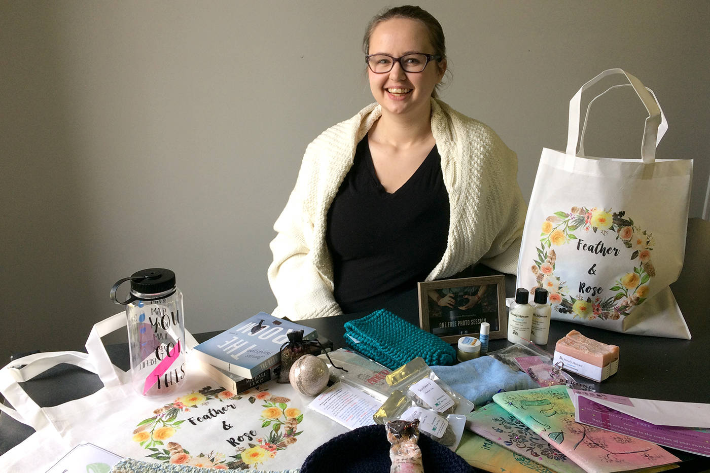 Chelsea O’Dell, from Chilliwack, with a few items to be included in a comfort bag through Feather & Rose Support Bags. The bags are given out to people across the province who are going through cancer treatment. (Jessica Peters/ The Progress)