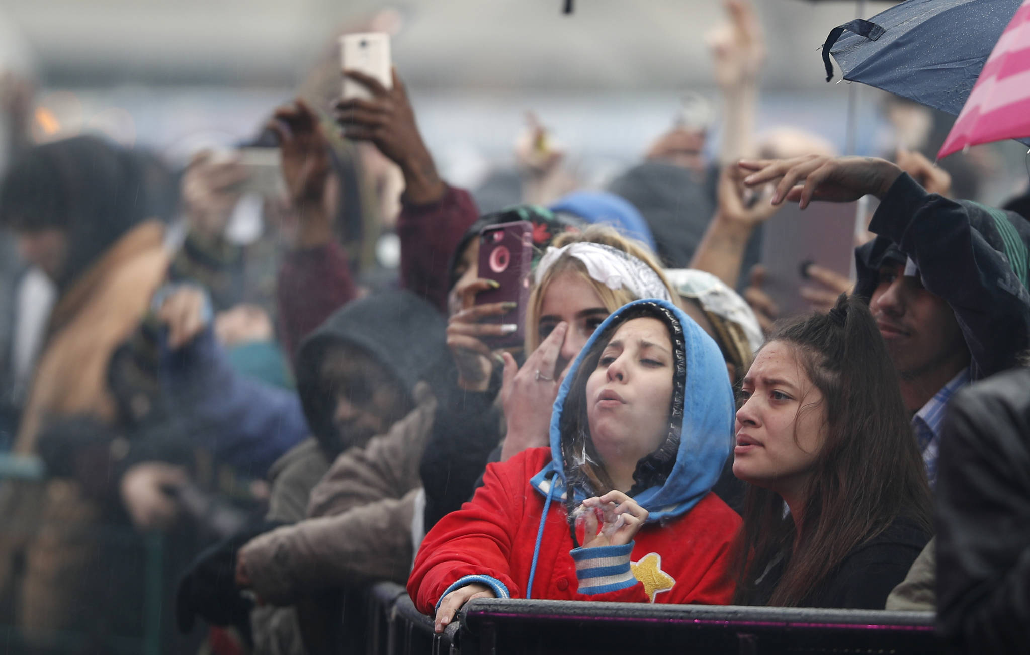 Attendees celebrate at 4:20 p.m. by lighting up marijuana during the Mile High 420 Festival Friday, April 20, 2018, in Denver. The annual celebration was projected to attract an estimated 50,000 people in Civic Center Park. (AP Photo/David Zalubowski)