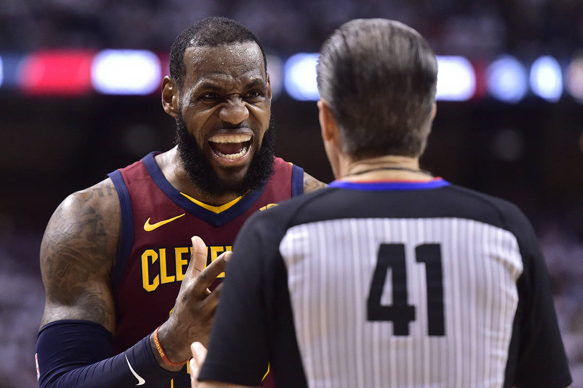 Cleveland Cavaliers forward LeBron James (23) has a conversation with a referee during second half NBA playoff basketball action in Toronto on Thursday, May 3, 2018. THE CANADIAN PRESS/Frank Gunn