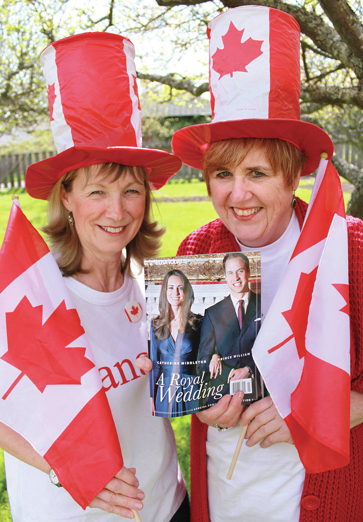 Oak Bay resident Jenni Hopkyns and Victoria resident Vivienne Phillips will show some true Canadian spirit among the crowds that gather in Windsor, England for the royal wedding. This is the second royal wedding they have crashed, the first – pictured here – was William and Kate’s in 2011. (Erin McCracken/Black Press)
