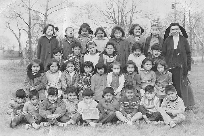 Angel Sampson’s Grade 1 photo at the Tsartlip Indian Day School. She’s in the second row, fourth from the left, in the plaid jacket. (Angel Sampson)