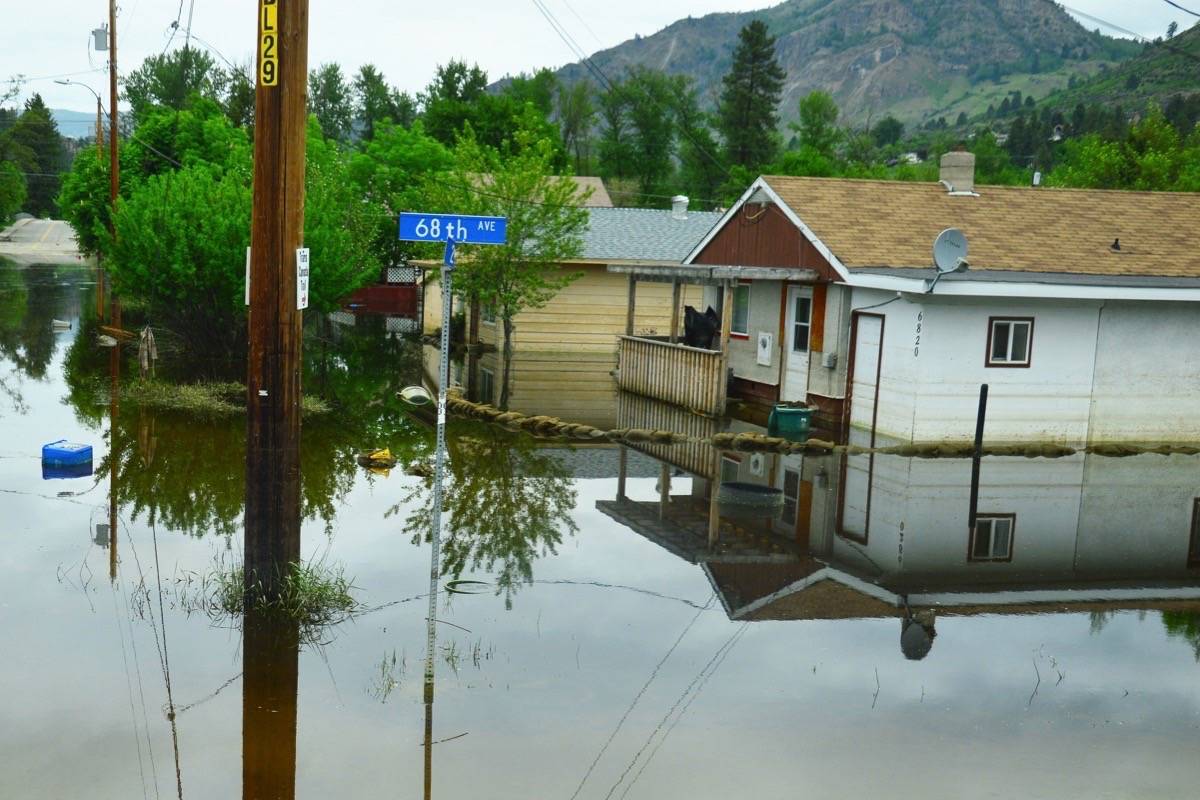Homes in the flooded Ruckle neighbourhood of Grand Forks Saturday. (Katya Slepian/Black Press Media)