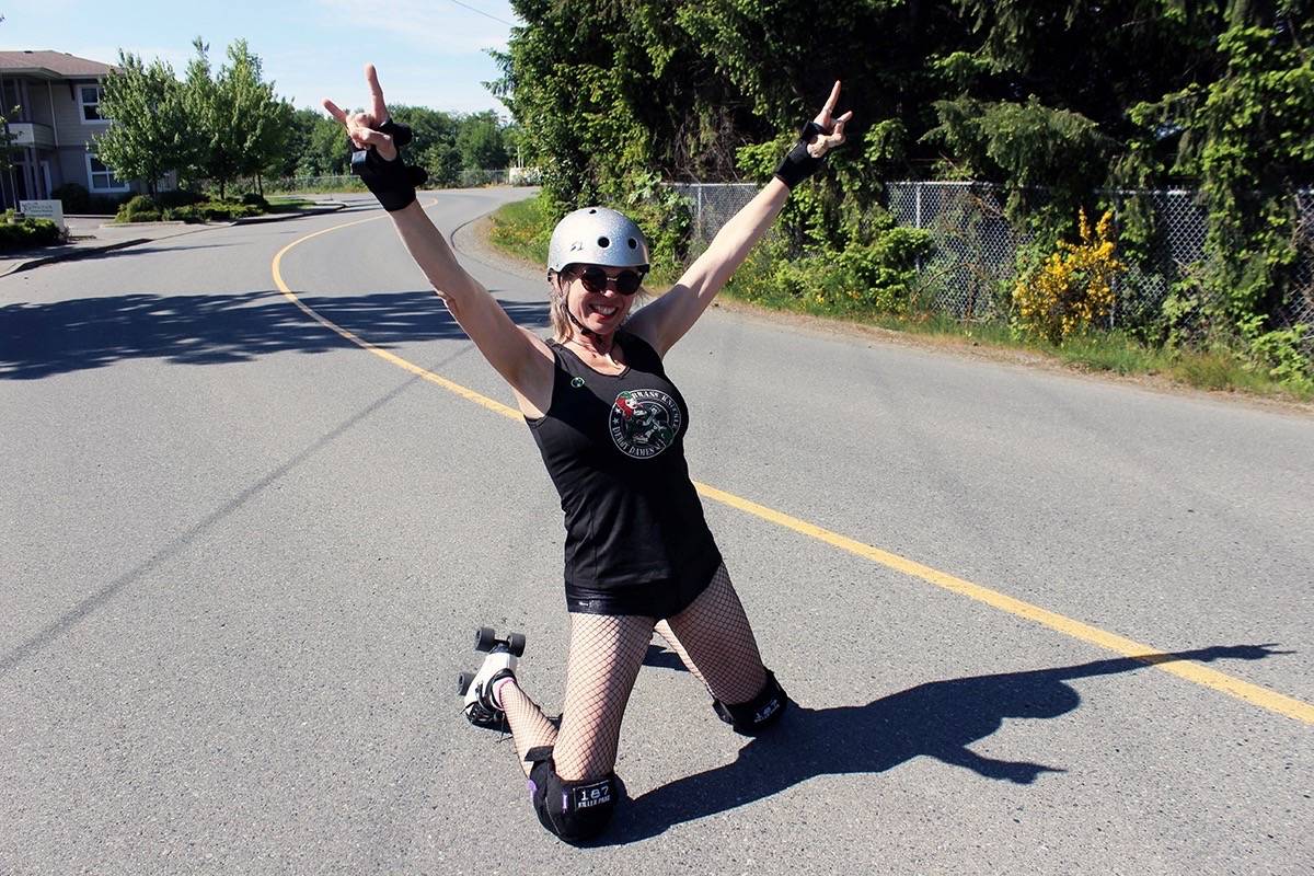 Monica Arthurs, a.k.a. Angel O’Deth, always makes a dramatic entrance when she suits up in her roller derby gear. (Don Bodger/Black Press)