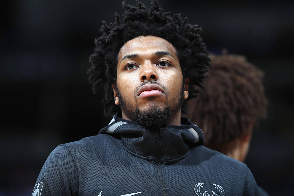 FILE - In this April 1, 2018, file photo, Milwaukee Bucks guard Sterling Brown is seen during an NBA basketball game in Denver. Milwaukee police plan to release body camera footage, Wednesday, May 23, 2018 from the officers who used a stun gun on Brown during an arrest. The release comes as city officials who’ve viewed the videos have expressed concern about how officers conducted themselves. Even leaders of the police department have hinted the video may make them look bad. (AP Photo/David Zalubowski, File)