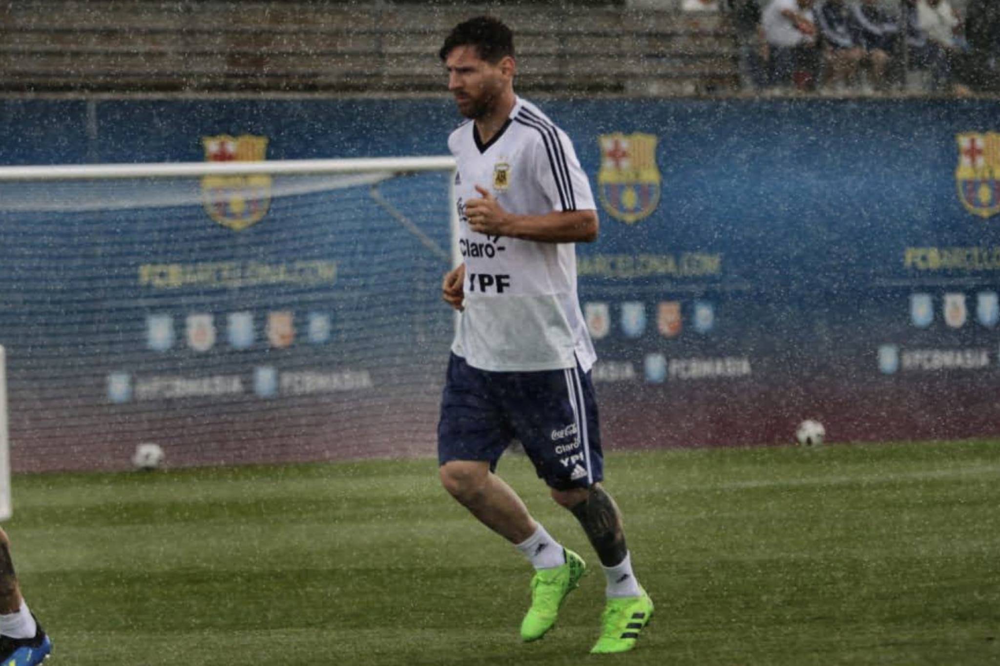 Argentine Captain, Lionel Messi, trains in the rain prior to their first match against Iceland on Saturday, June 16. Messi has yet to win the coveted World Cup. (via @Argentina/Twitter)