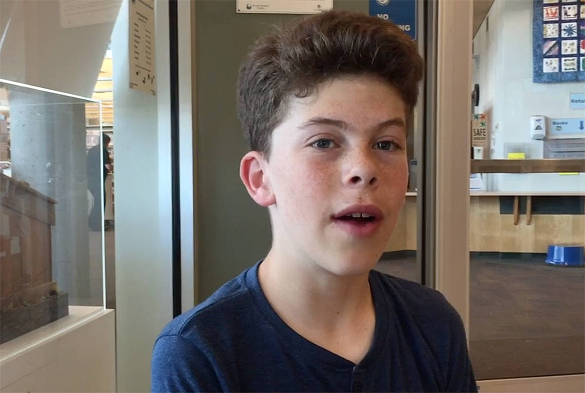 Quamichan campus Grade 8 student Simon Minkow talks about the reasons to give 16-year-olds the vote. (Lexi Bainas/Citizen)