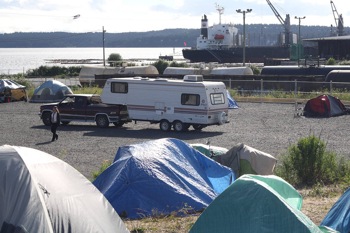 Cori Mitchell arrives at Discontent City on Friday morning in her fifth-wheel. GREG SAKAKI/The News Bulletin
