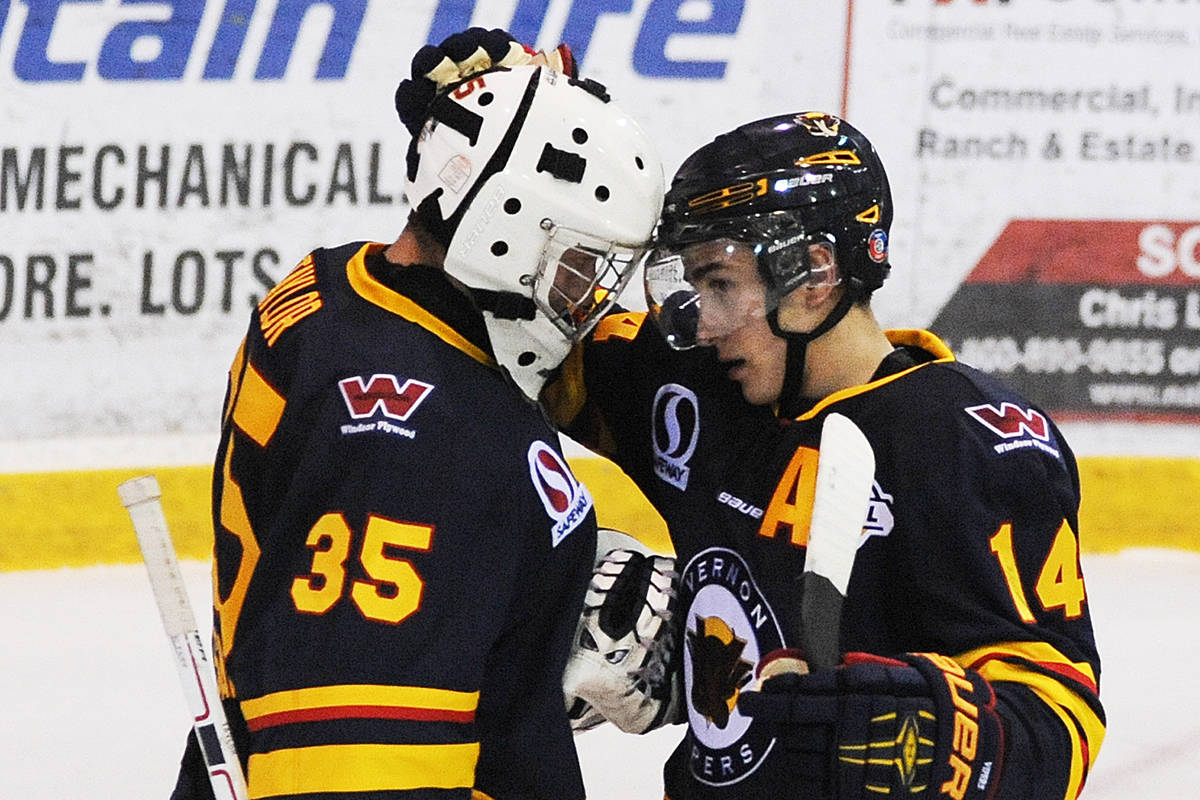 Vernon Viper goalie Ty Taylor, getting a hug from teammate Jesse Lansdell, is one of 58 B.C. Hockey League players attending NHL development camps. Taylor was selected by the Tampa Bay Lightning in the NHL entry draft. (Morning Star File)