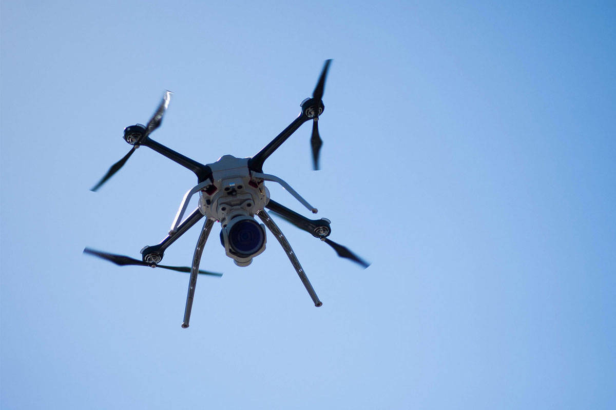 A drone flying over a wildfire near Nakusp suspended firefighting air operations Sunday. Photo: James MacDonald/Bloomberg