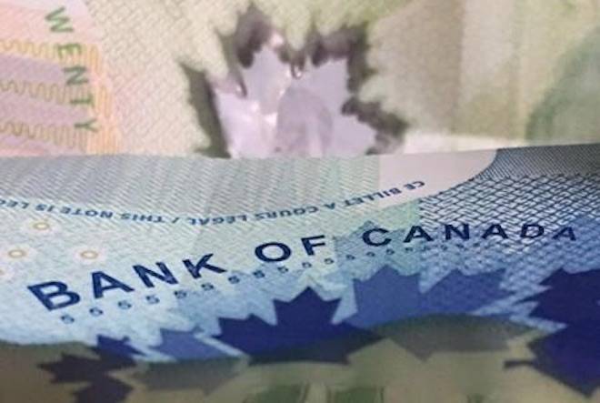 Canadian bank notes are seen, in Ottawa on Wednesday, September 6, 2017. THE CANADIAN PRESS/Adrian Wyld