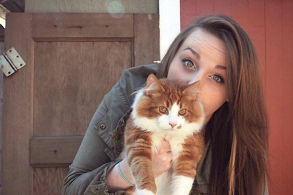Emilie Thurber and Gideon the cat before the coyote attack. (Submitted)