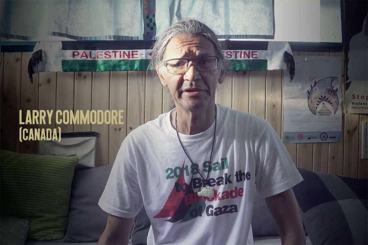 A still from a YouTube video showing Soowahlie elder Larry Commodore on board the Al Awda as part of the Freedom Flotilla to Gaza. The ship was boarded by the Israeli navy on July 29 and all were detained. (YouTube)