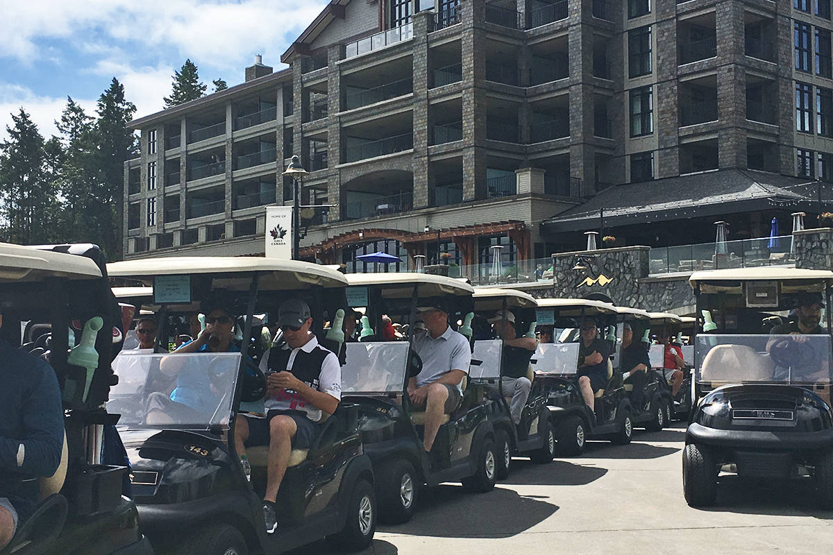 Golfers line up at the Westin Bear Mountain Golf Resort before playng in the 13th annual BC Ferries Media Charity Golf Classic, a fundraiser this year benefitting Big Brothers and Big Sisters of Victoria. The event raised $50,000 for the cause. Don Descoteau/Victoria News