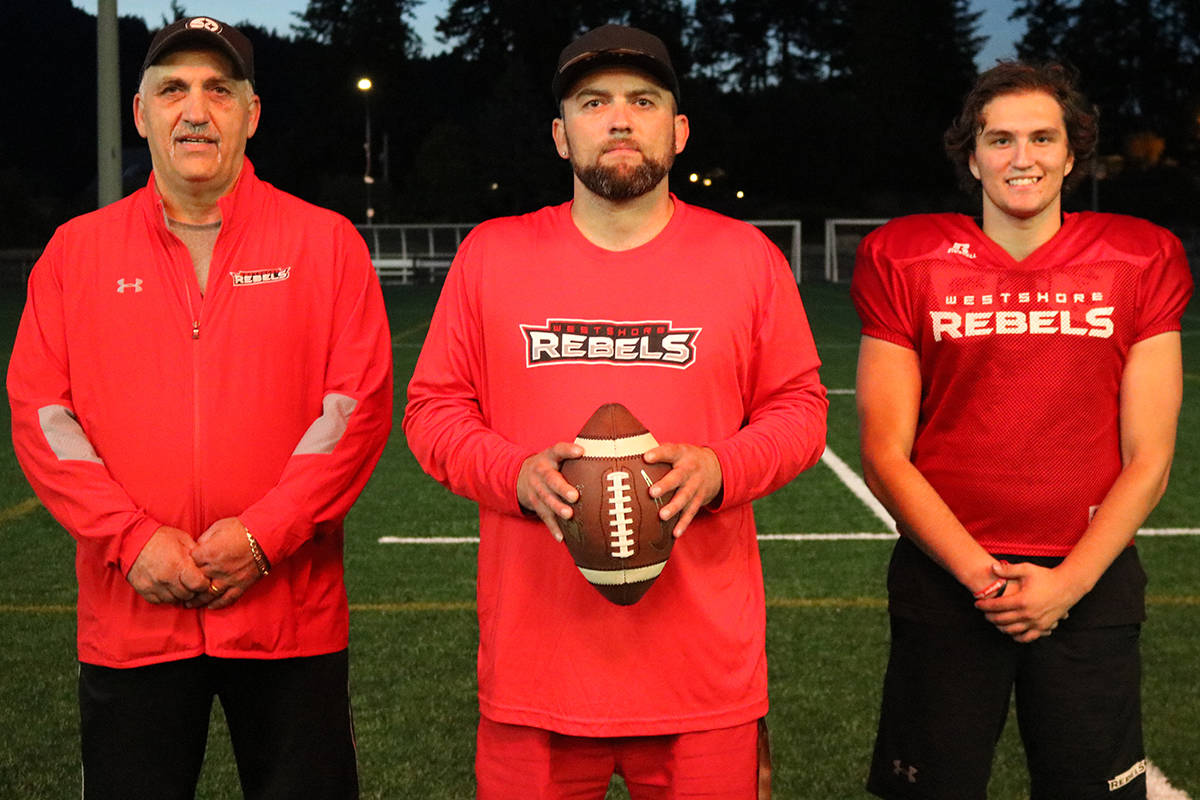 John Cardilicchia (left), Rebels’ special teams coach, Charly, Rebels’ head coach, and Isaiah, Rebels’ slotback and wide receiver, represent three generations of the Cardilicchia name on the Westshore Rebels. (Lindsey Horsting/News Gazette staff)