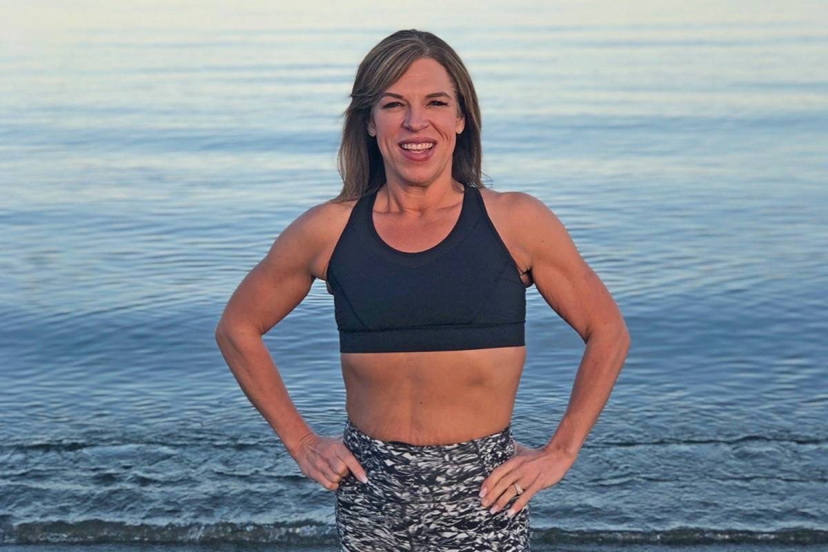 Langford resident Julie Marchak, standing at Esquimalt Lagoon, lost 145 pounds and is now encouraging others to make healthier life choices.  (Contributed photo)