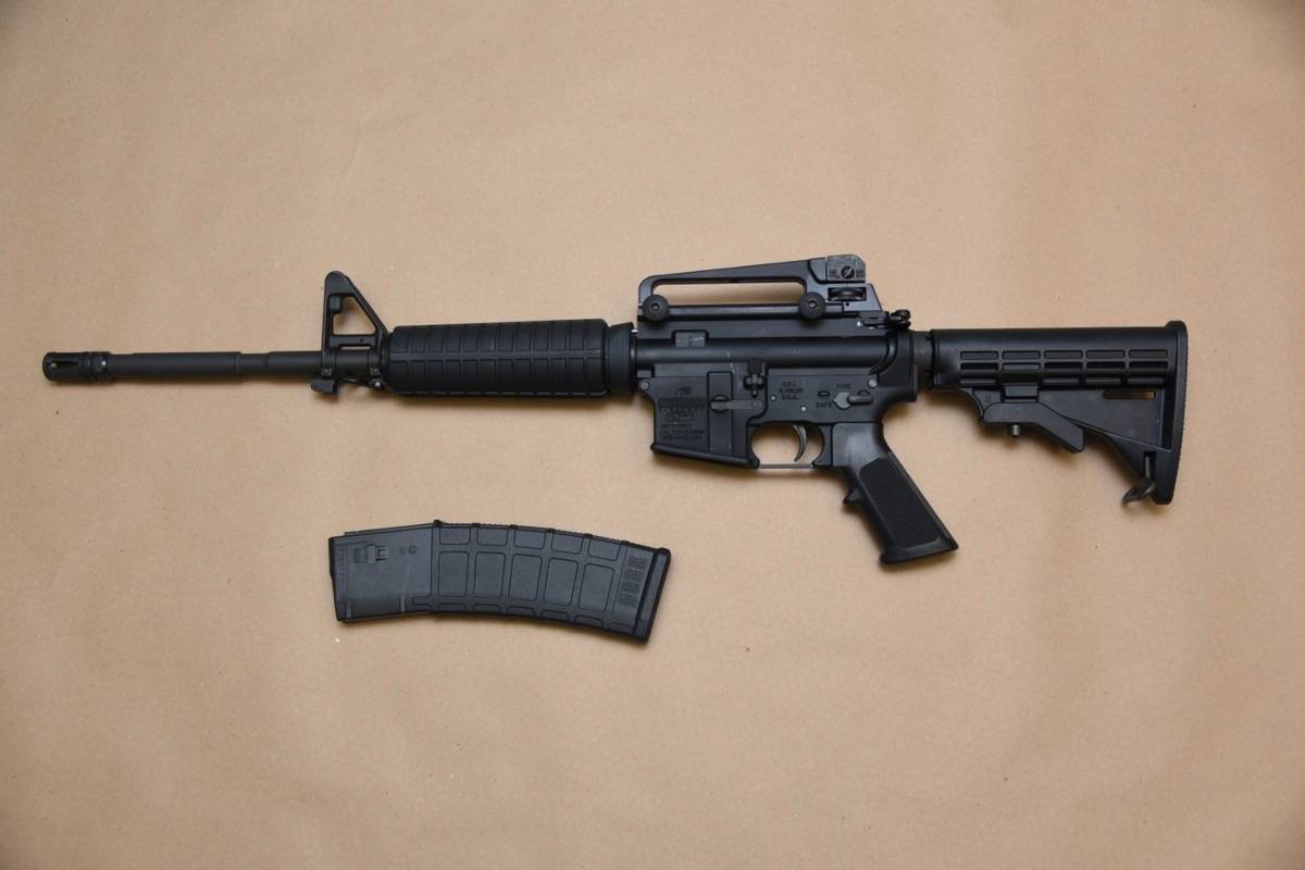 A Bushmaster 5.56 semi-automatic rifle seized during the investigation. (Delta Police Department photo)