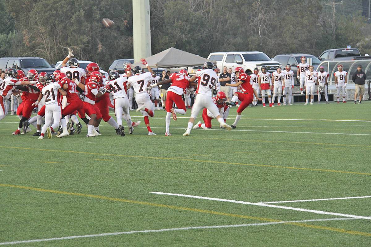 The Westshore Rebels defeated the Vancouver Island Raiders 22-17 in a heated game Saturday night at Westhills Stadium. (Jessica Fedigan/News Gazette staff)