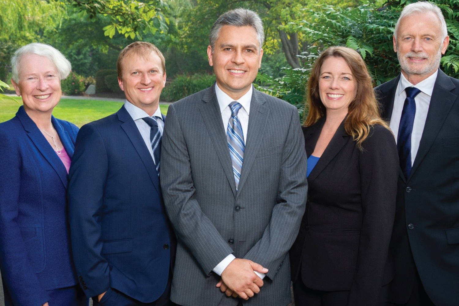 Mayor Richard Atwell (centre) is one of five members part of United for Saanich running in the upcoming municipal election. Other members include Coun. Karen Harper and candidates Cory Montgomery, Kathleen Burton and Ian Jessop.                                Photo submitted