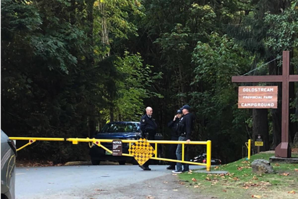 A sign at the entrance of Goldstream Provincial Park reads “closed” as West Shore RCMP officers stand guard prohibiting the public from entering. Marilou Gagnon photo