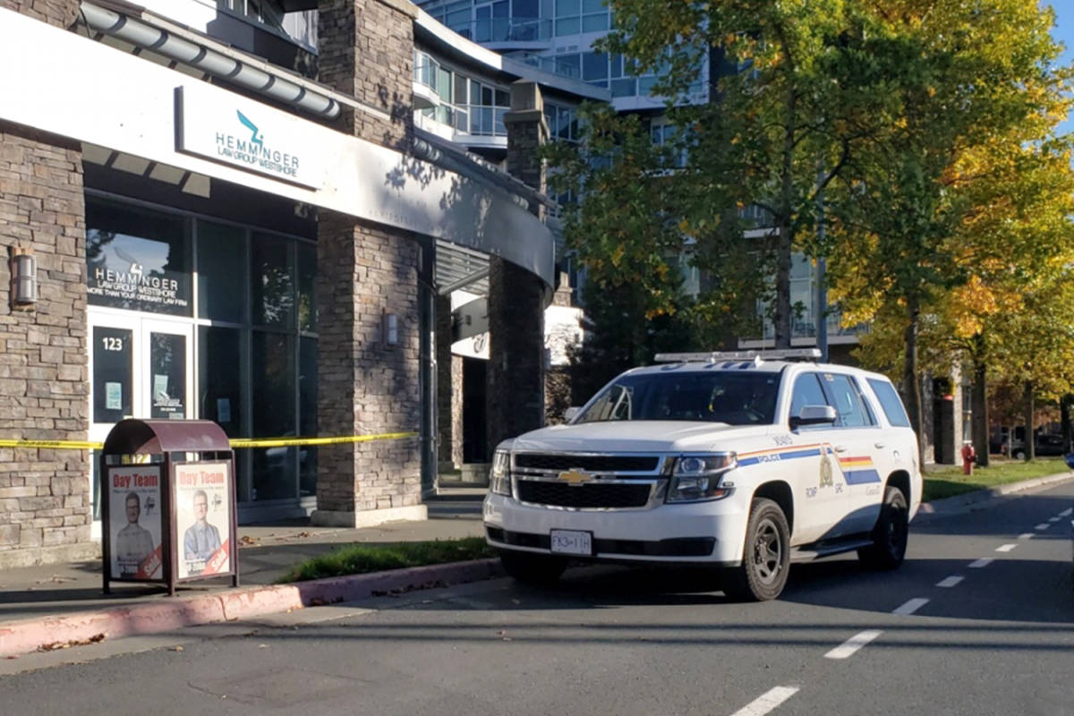 West Shore RCMP were seen at Hemminger Law Group Monday where the office was blocked off with police tape. (Ragnar Haagen/News staff)