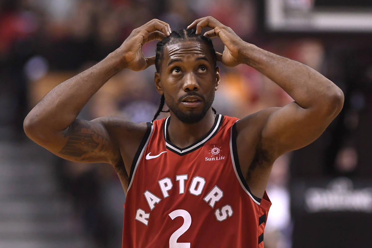 Toronto Raptors forward Kawhi Leonard (2) reacts during second half NBA basketball action against the Cleveland Cavaliers in Toronto on Wednesday, October 17, 2018. THE CANADIAN PRESS/Nathan Denette