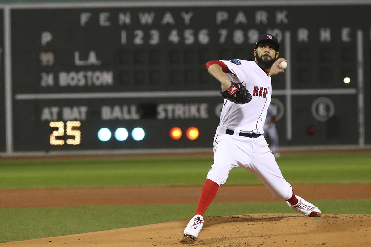 Boston Red Sox starting pitcher David Price throws during the first inning of Game 2 of the World Series baseball game against the Los Angeles Dodgers Wednesday, Oct. 24, 2018, in Boston. (AP Photo/Maddie Meyer, Pool)